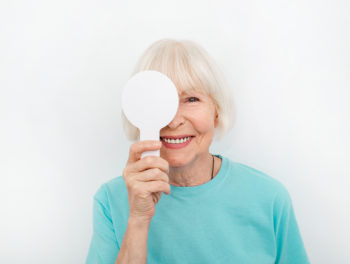 Woman with paddle during eye exam