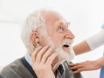 man with hearing aid